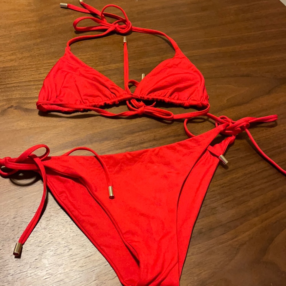 Never worn Monday Swimwear Rare Red tie swimsuit! Size SM!